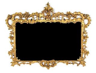 A Louis XV Style Giltwood Over Mantel Mirror Height 53 x width 63 1/2 inches.