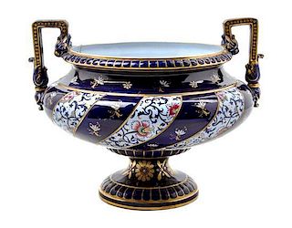* A Sarreguemines Ceramic Urn Height 11 3/4 x width over handles 14 3/4 inches.