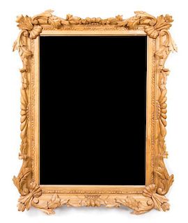 A French Fruitwood Mirror Height 54 x width 42 1/2 inches.