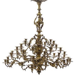 A Louis XV Style Gilt Bronze Forty-Two Light Chandelier Height 50 x width 44 inches.