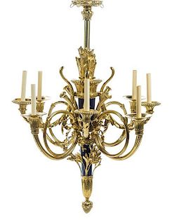 A French Gilt Bronze Eight-Light Chandelier Height 45 x width 32 inches.