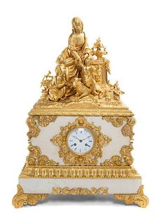 * A Louis XVI Style Gilt Bronze Mounted Mantel Clock Height 27 1/2 inches.