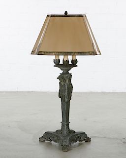 A Pompeiian style patinated bronze lamp