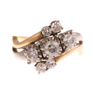 A Ladies Diamond Bypass Ring in 14K & Platinum