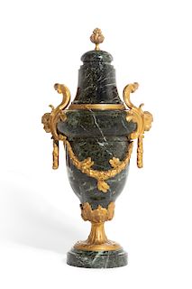A Louis XVI style gilt bronze mounted marble urn
