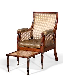 A Regency mahogany bergere and foot stool