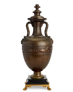 A Continental bronze urn now as a lamp