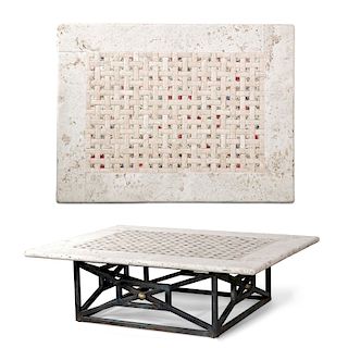An outdoor lattice tile and steel low table