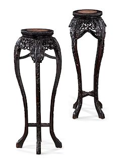 A pair of Chinese carved hardwood plant stands