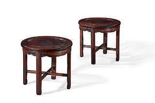 A pair of Chinese carved hardwood low tables