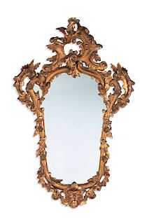 An Italian Baroque style carved giltwood mirror