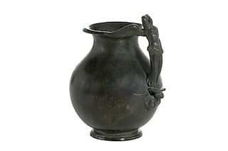 An Italian patinated bronze jug 