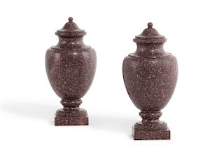A pair of Egyptian porphyry urns