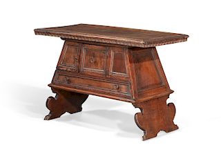 An Italian Baroque style walnut occasional table
