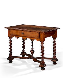 A Continental Baroque style walnut side table