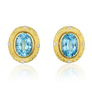 A Pair of Large Topaz and Diamond Earclips