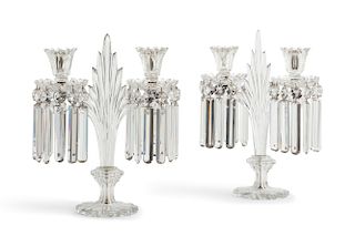 A pair of English cut glass two light candelabra