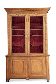 A French carved oak vitrine cabinet