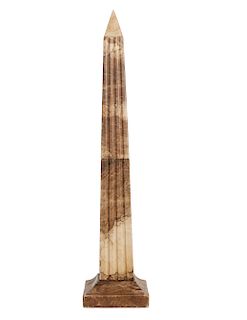 A carved mottled brown alabaster obelisk