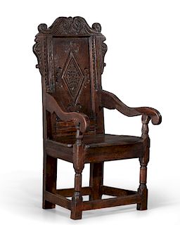 A Charles I oak and elm wainscot armchair, Leeds, 17th C