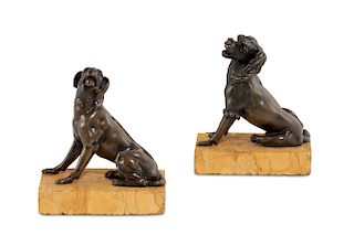 A pair of Italian bronze dogs