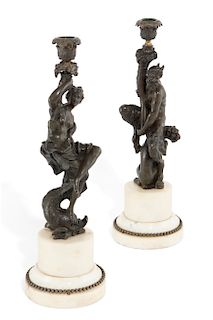 A pair of French bronze and marble  candlesticks