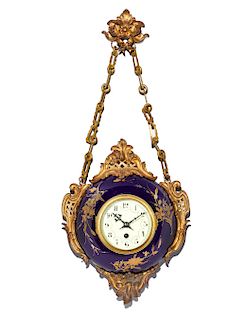 A French gilt bronze mounted porcelain wall clock