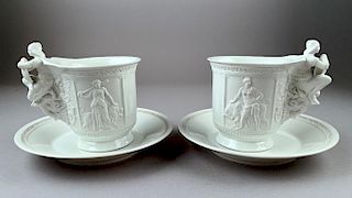 Pair Oversized Berlin Porcelain Figural Cups and Saucers, 19thc.