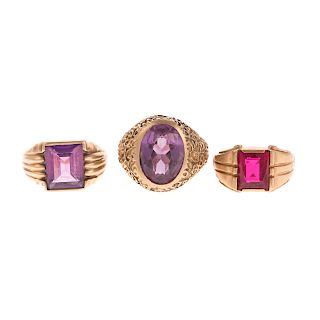 A Trio of Gent's Gemstone Rings in Gold