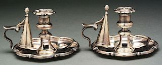 A Pair of English Silver Chambersticks.