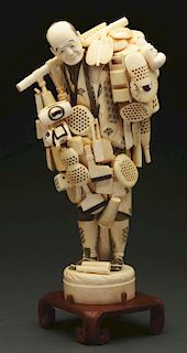 Large Carved Ivory Japanese Man Carrying Baskets.