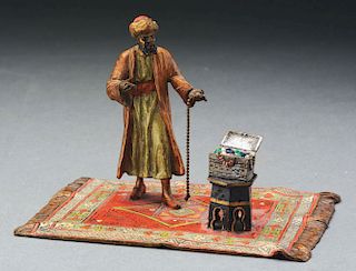 Austrian Bronze Figure of Man on Carpet with Box and Jewels.