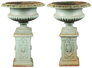 Monumental Victorian Pair of Cast Iron Campagna Form Urns on Tall Pedestals.