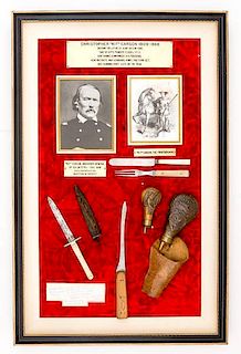 Framed Collection of Knives, Powder Flasks and a Holster with Reported Kit Carson Connection 