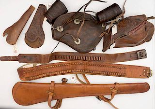 Collection of Western Ephemera: Cartrige Belts, Holsters, Cowboy Cuffs, and Tapaderos 