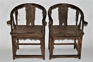 Pair of Carved Saddleback Chinese Chairs