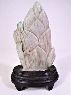 Carved Light Green Stone with Wooden Base