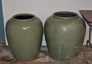 Two Large Green Glazed Storage Jars