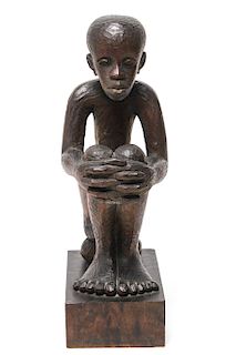 African Carved Wood Seated Boy Sculpture