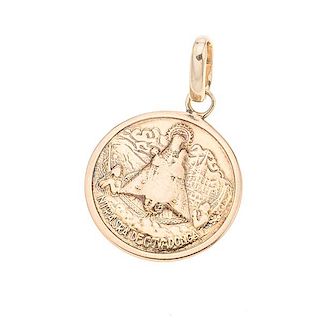 Medalla en oro amarillo de 8K. Imagen de nuestra señora de Covadonga. Peso: 3.6 g.