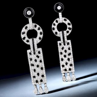A Pair of Diamond and Onyx Earrings