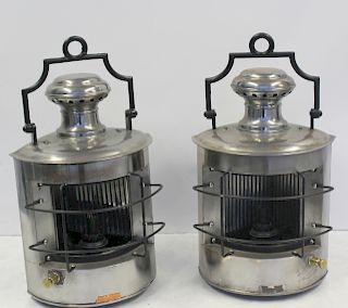 A Pair Of Polished Metal Ship's Lanterns