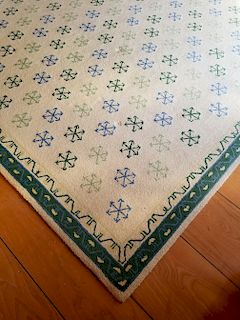 Creme Broadloom Carpet with Green and Blue Snowflakes Central Pattern