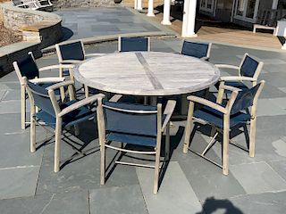 Round Teak Dining Table and 8 Assembled Chairs with Blue Woven Seats and Backs