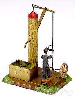 Doll painted tin man at pump steam toy accessory