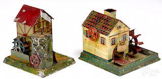 Two painted tin water wheel steam toy accessories
