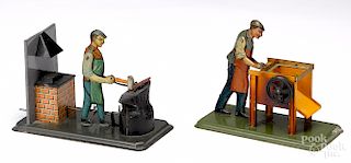 Two tin lithograph workmen steam toy accessories