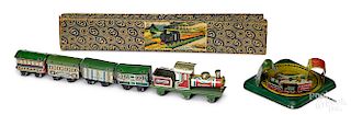Two lithograph tin train penny toys