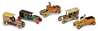 Five tin lithograph truck penny toys