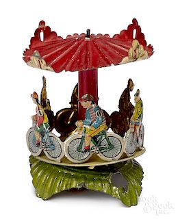 Meier tin lithograph bicycle carousel penny toy